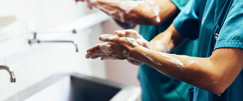 A surgeon washing his hands