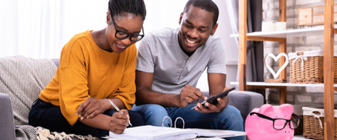 black couple going through paperwork